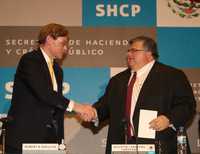 El presidente del Banco Mundial, Robert Zoellick, y el secretario de Hacienda, Agustín Carstens, en la conferencia de prensa que ofrecieron ayer en Palacio Nacional