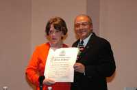 Teresa del Conde y Carlos-Blas Galindo durante la ceremonia de ingreso de la historiadora a la Academia de las Artes