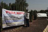 Sindicalizados del Instituto Nacional de Antropología e Historia, ayer, durante el paro que realizaron en defensa de la zona arqueológica de Teotihuacán